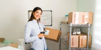 happy-be-working-my-own-business-startup-female-entrepreneur-smiling-while-holding-package-scanner_662251-1897